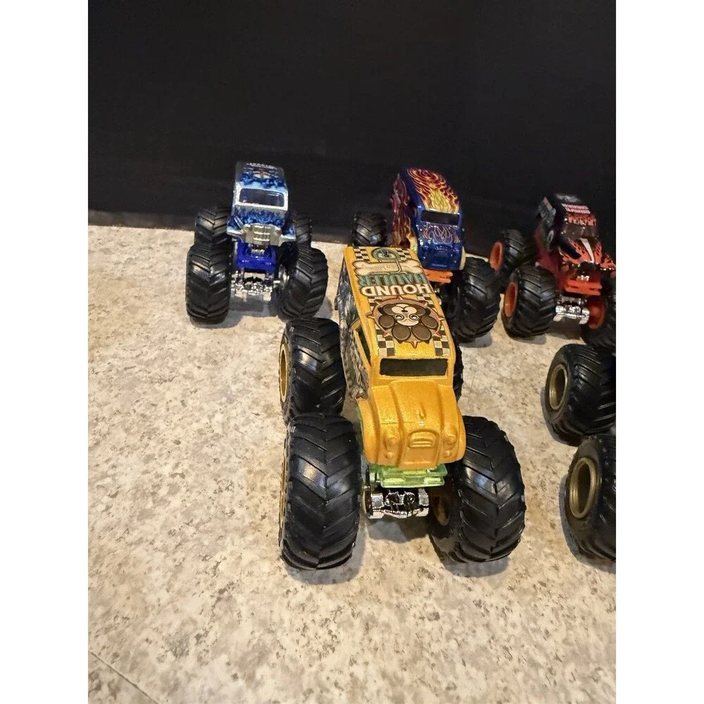Hot Wheels Monster Trucks Lot of 12 1:64 Wonder Woman Skull Camo Flame Mixed